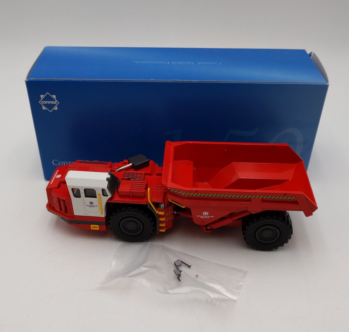 Conrad 1:50 Scale Sandvik TH550 Underground Dump - Soletanche Bachy LN/Box