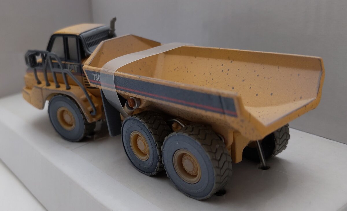 Norscot 55184 1:87 Weathered CAT 730 Articulated Dump Truck LN/Box
