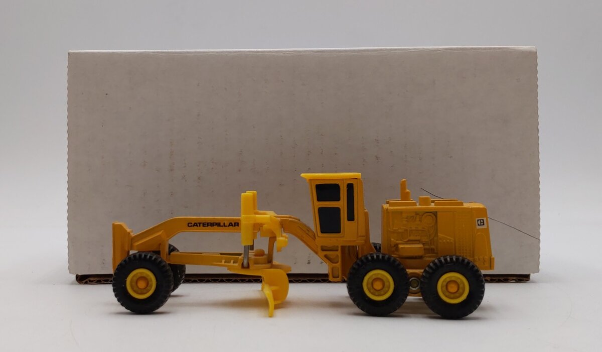 ERTL Mighty Movers 1:64 Scale Caterpillar Road Grader LN