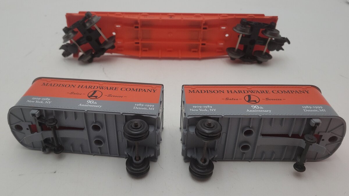 Lionel 6-52187 O Gauge Madison Hardware Flatcar w/ Piggyback Vans VG/Box