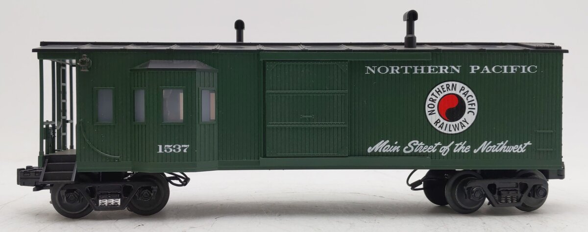 MTH 30-7725 O Gauge Northern Pacific Work Caboose with Bay Window EX/Box
