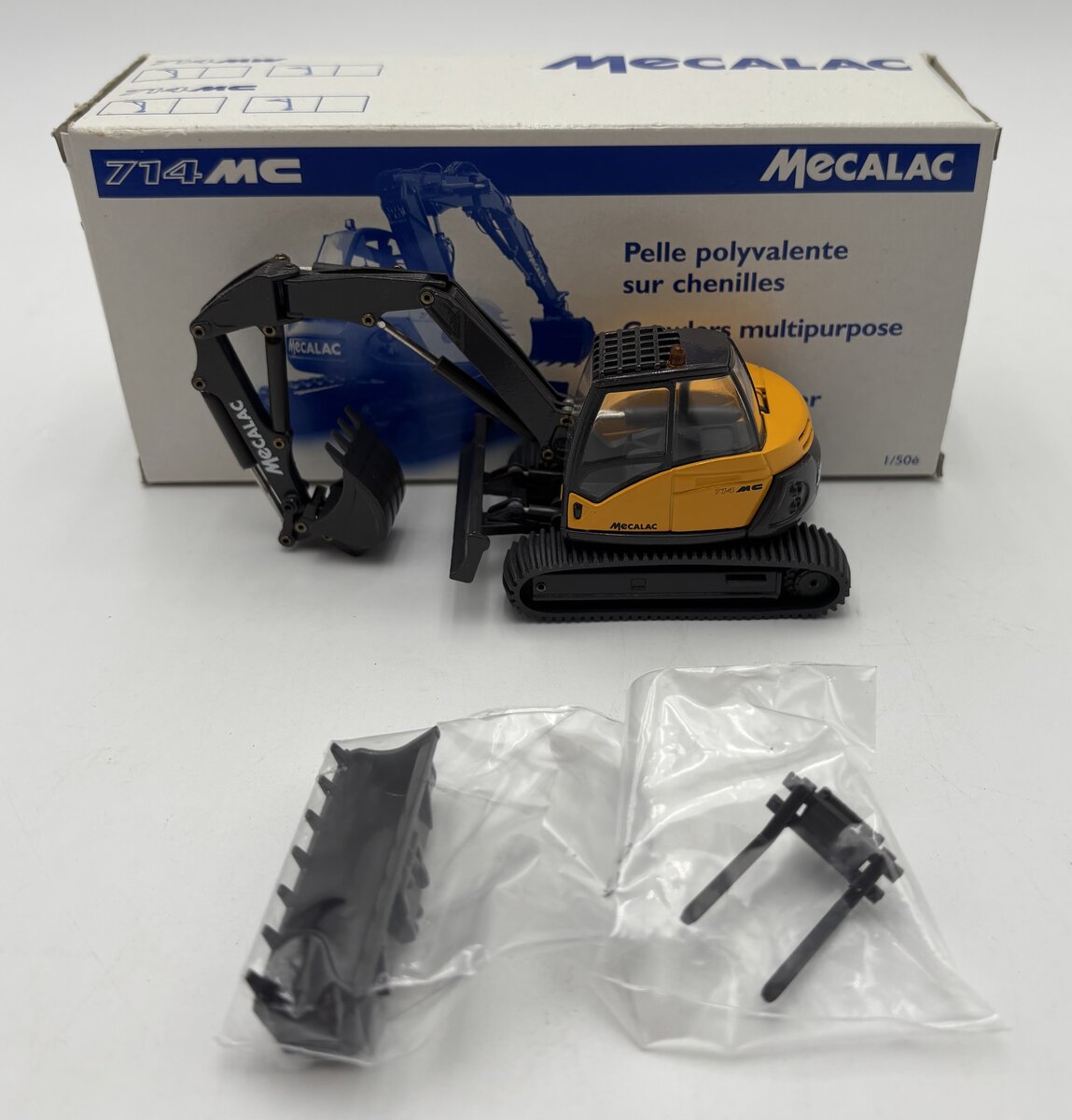 Conrad 2919 1:50 Mecalac 714 MC Track Excavator LN/Box