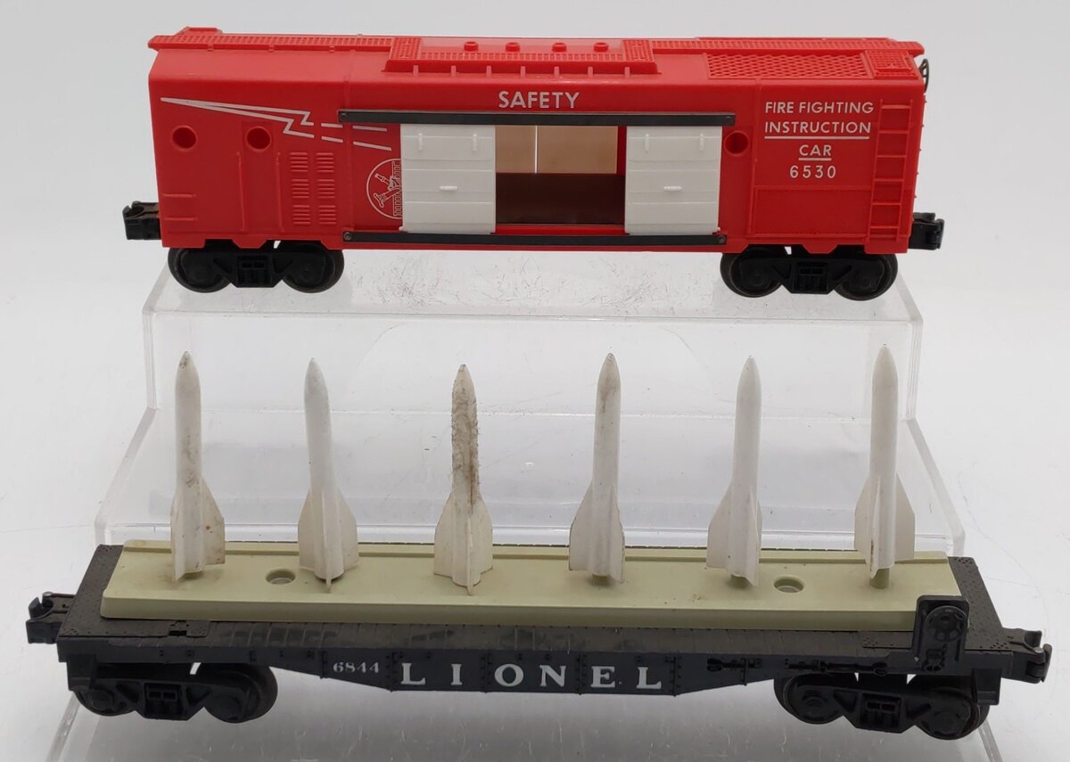 Lionel Vintage O Gauge 6530 Fire Instruction Car & 6844 Missile Storage Car VG