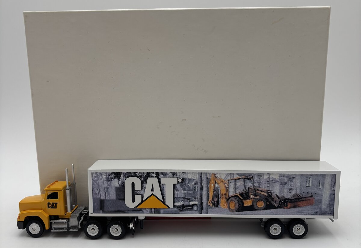 Winross 1:50 Scale Diecast CAT Backhoe 48' Trailer & Semi Tractor LN/Box