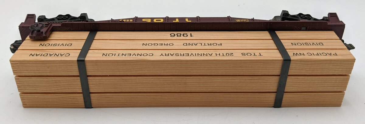 Lionel 6-6582 O Gauge TTOS-1986 Convention Flatcar w/Wood Load LN