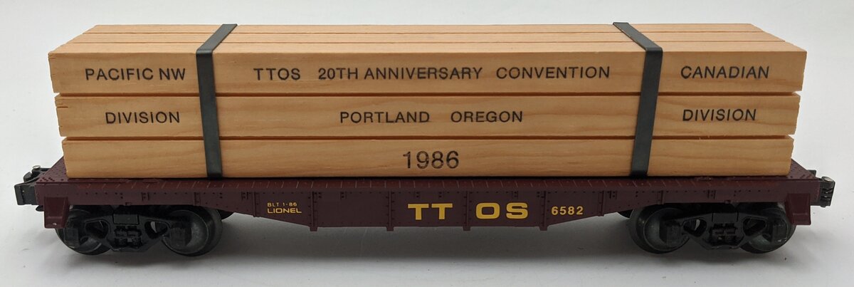 Lionel 6-6582 O Gauge TTOS-1986 Convention Flatcar w/Wood Load LN