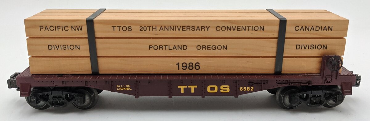 Lionel 6-6582 O Gauge TTOS-1986 Convention Flatcar w/Wood Load LN