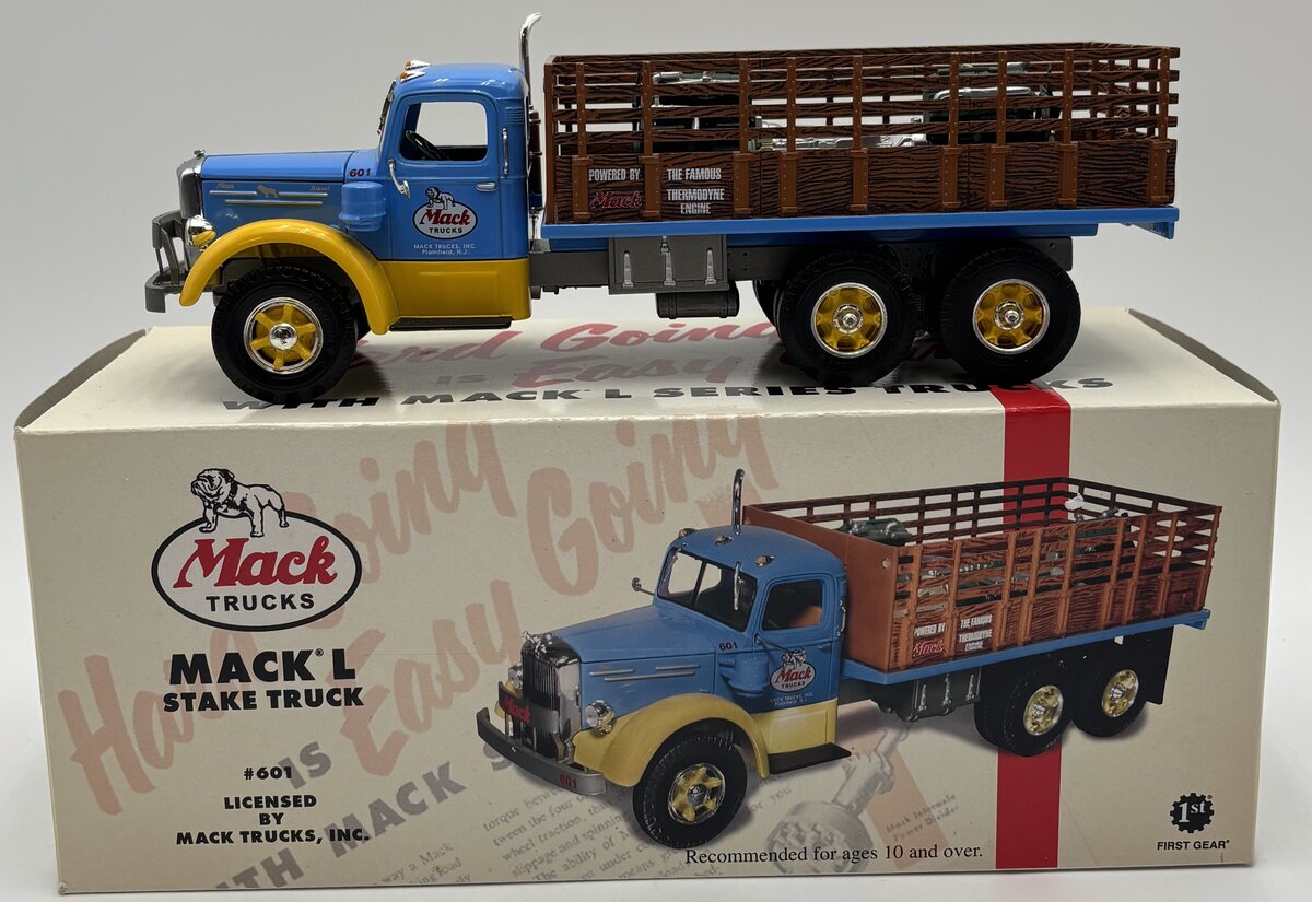 First Gear 19-3155 1:34 Mack L Series Stake Truck with Engine Load LN/Box