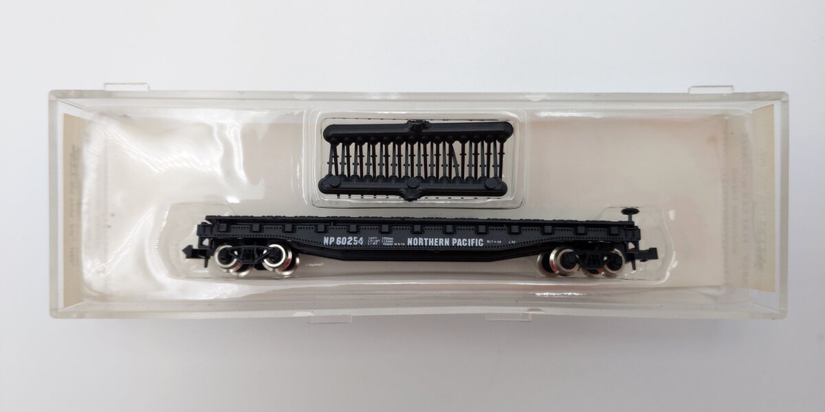 Atlas 3809 N Scale Northern Pacific 50' Flat Car with Stakes #60254 LN/Box