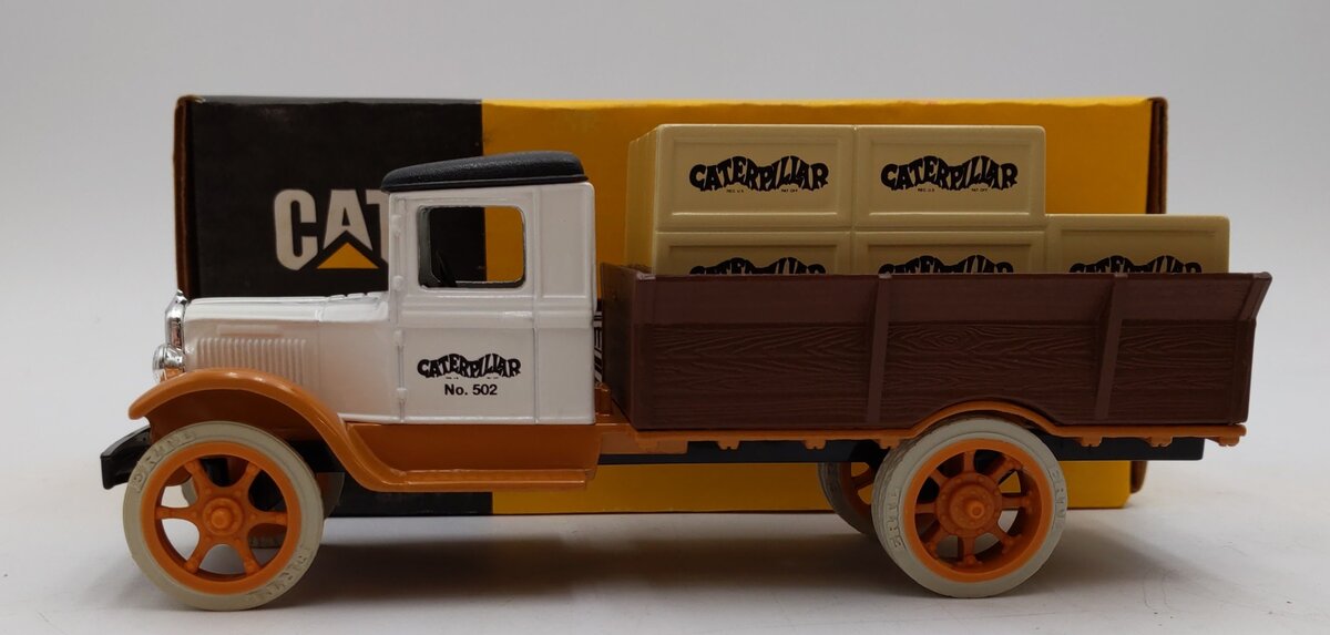 Ertl 1:34 Scale Caterpillar 1931 Hawkeye Truck Bank NIB