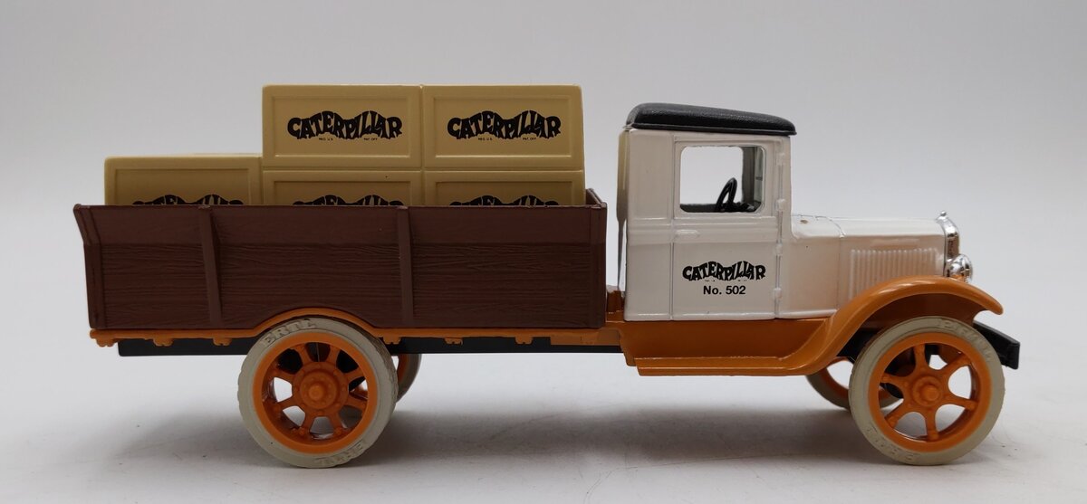 Ertl 1:34 Scale Caterpillar 1931 Hawkeye Truck Bank NIB