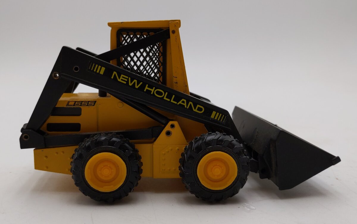 NZG Modelle 1:25 Scale DieCast Sperry New Holland L-555 Super Book Loader EX/Box