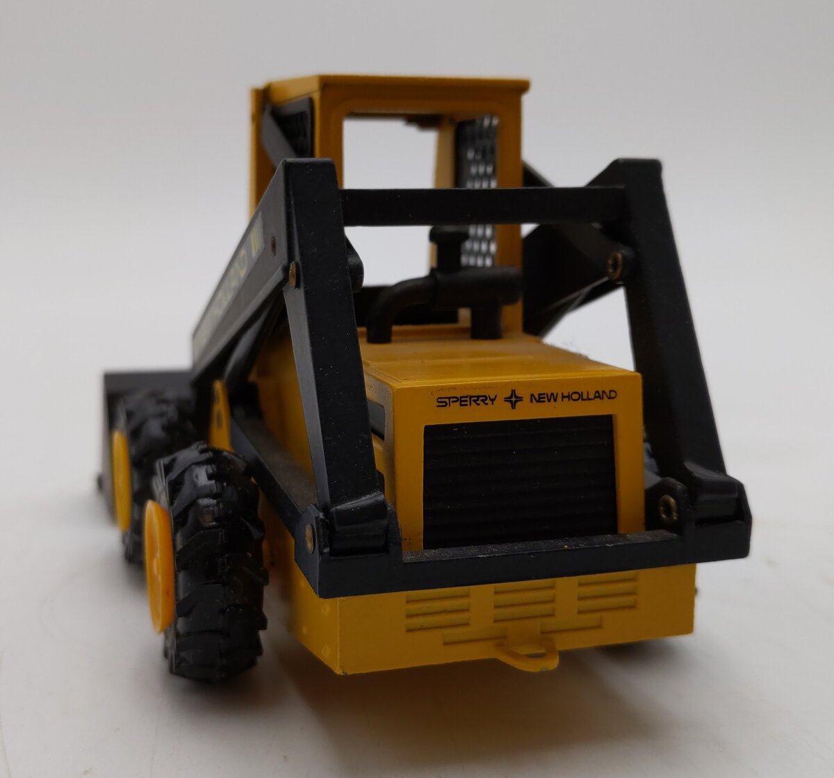NZG Modelle 1:25 Scale DieCast Sperry New Holland L-555 Super Book Loader EX/Box