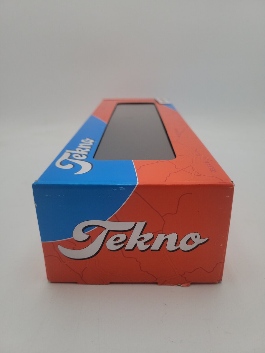 Tekno 70581 1:50 Scale Linderberg Mack F700 (6x4) Tandem w/Axles Flatbed Trailer EX/Box