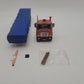 Tekno 70581 1:50 Scale Linderberg Mack F700 (6x4) Tandem w/Axles Flatbed Trailer EX/Box