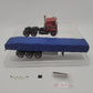 Tekno 70581 1:50 Scale Linderberg Mack F700 (6x4) Tandem w/Axles Flatbed Trailer EX/Box