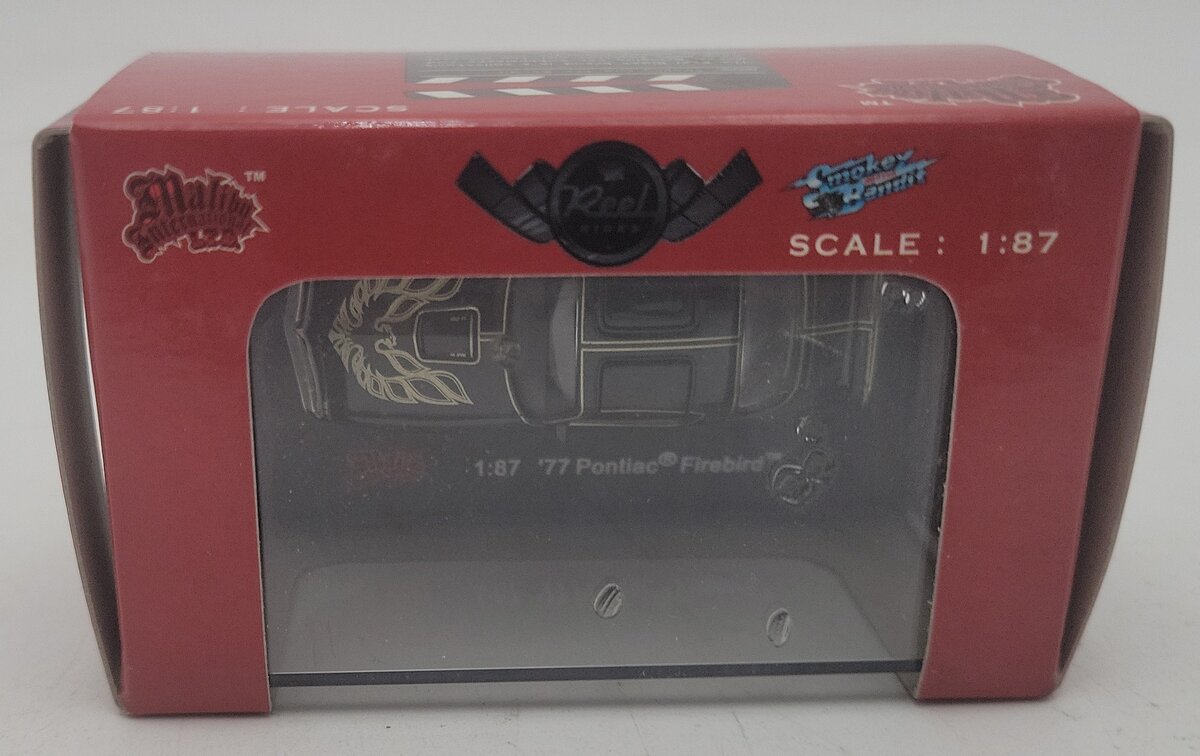 Malibu International 09203 1:87 Black Smokey '77 Pontiac Firebird EX/Box