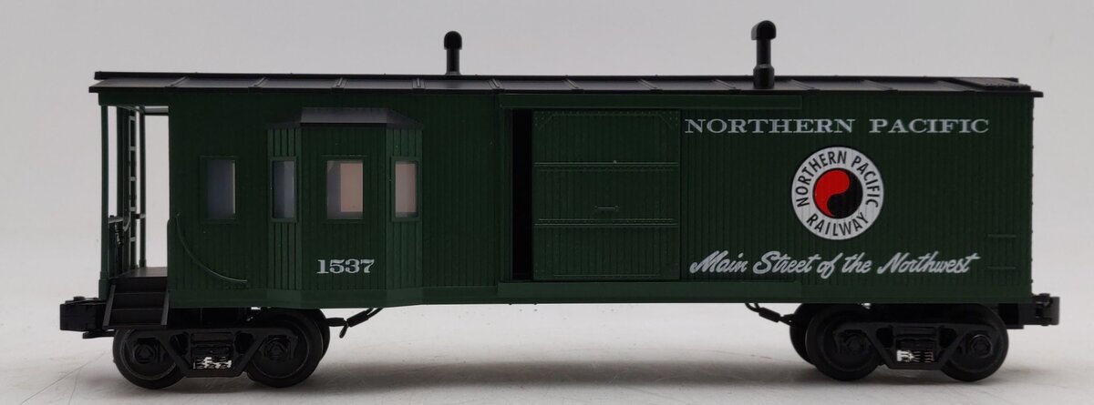 MTH 30-7725 O Gauge Northern Pacific Work Caboose with Bay Window LN/Box