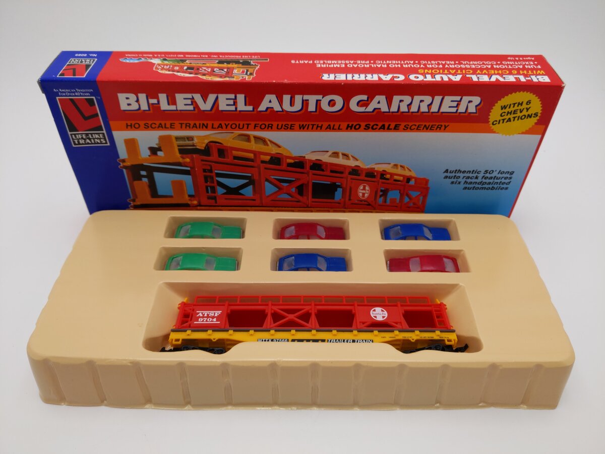 Life Like 8089 HO Scale Bi-Level Auto Carrier W/ 6 Chevy Citations Kit LN/Box