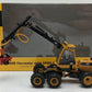 Norscot 55123 1:50 Caterpillar 580B Harvester With HH65 Cutting Head LN/Box
