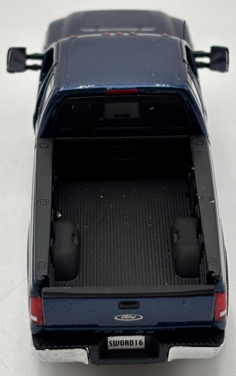 Sword 1100-B 1:50 Ford F250 XLT Pickup with Super Cab & 8" Bed in Dark Blue EX
