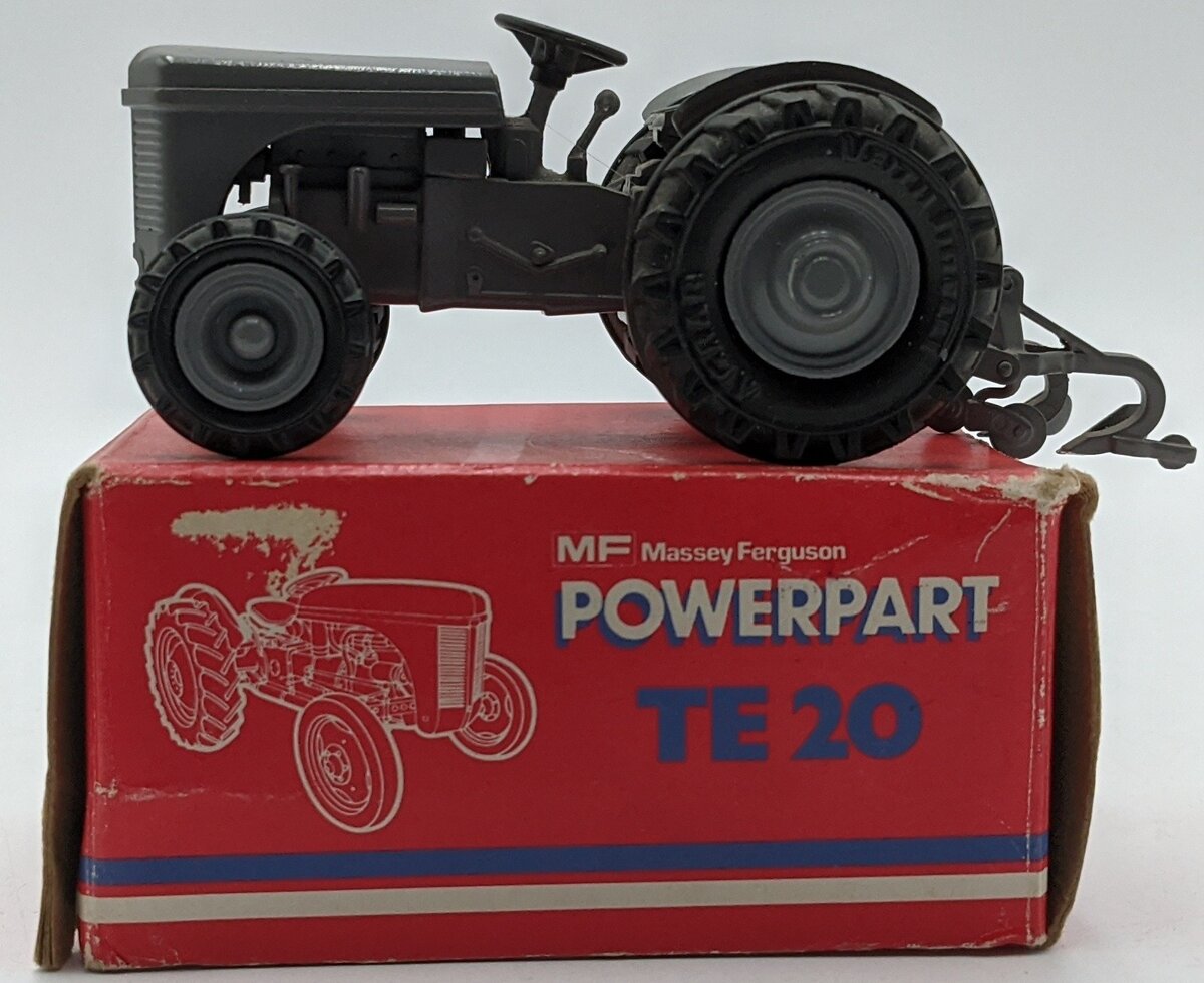 Conrad 5012 1:50 Diecast Massey Ferguson Tractor w/Plow NIB