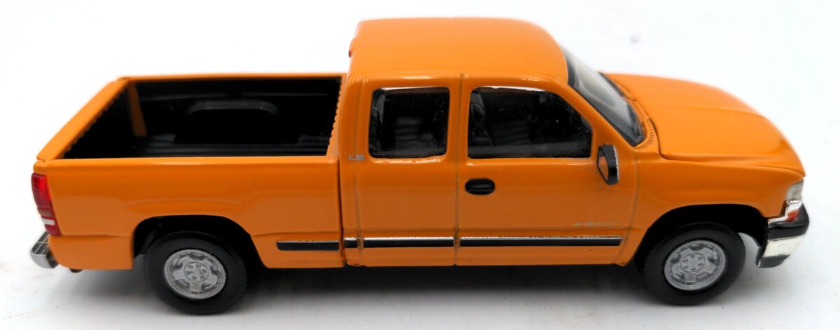 Ertl 1:50 Scale Diecast 2000 Silverado Orange Truck EX