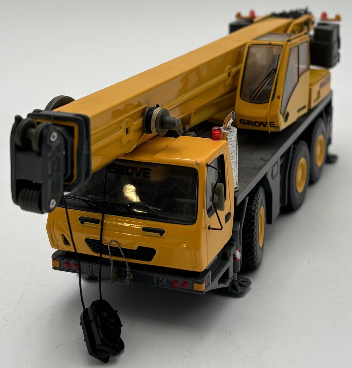 TWH Collectibles 003Y 1:50 Yellow GMK3055 3-Axle Crane EX