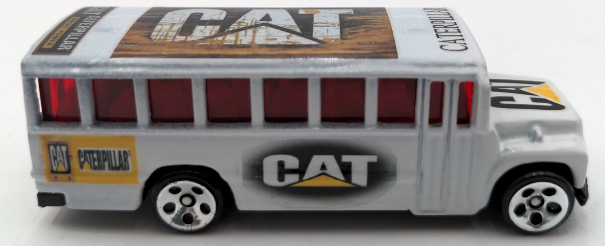 Mattel 1:64 Scale Diecast Hot Wheels Caterpillar-Themed School Bus NEW