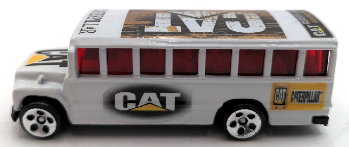 Mattel 1:64 Scale Diecast Hot Wheels Caterpillar-Themed School Bus NEW