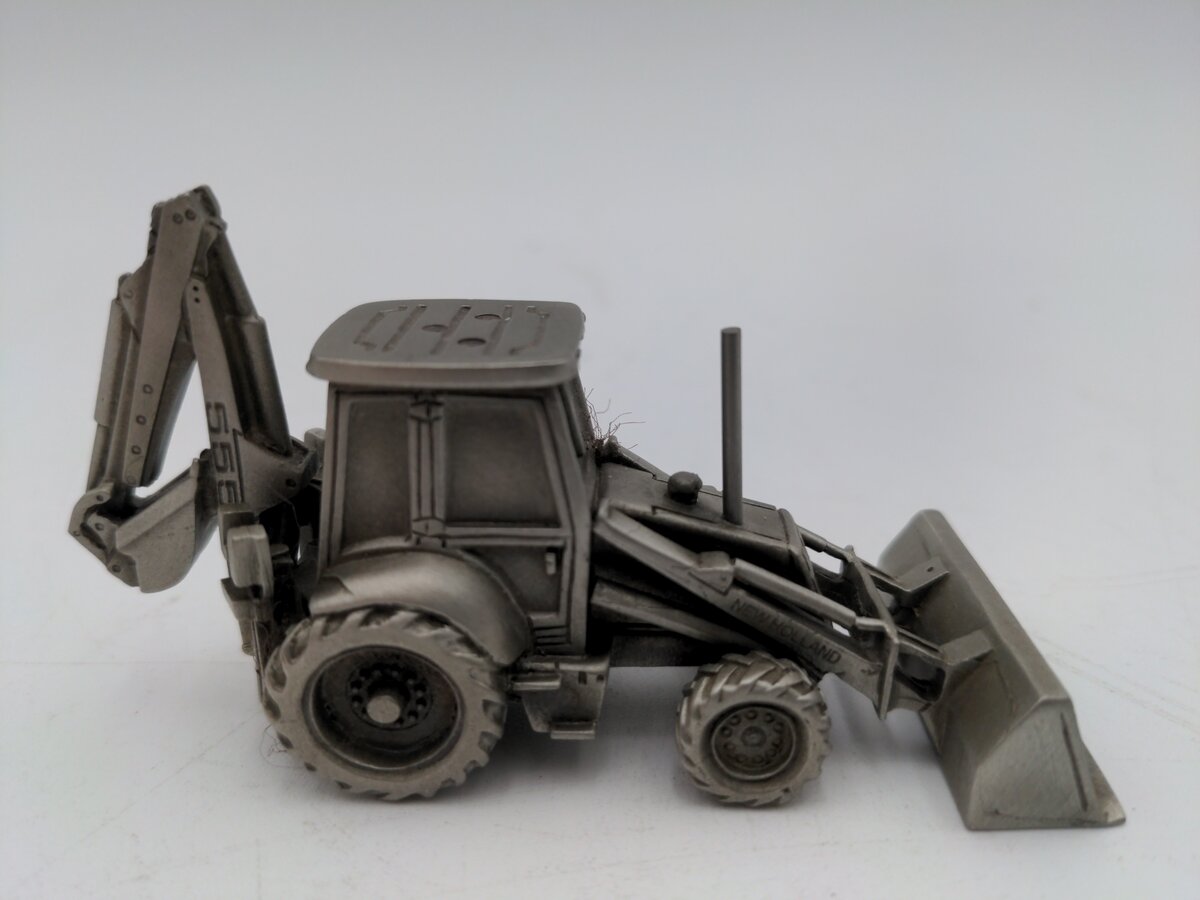 SpecCast Tractor Loader Backhoe 1999 Pewter New Holland 555E VG