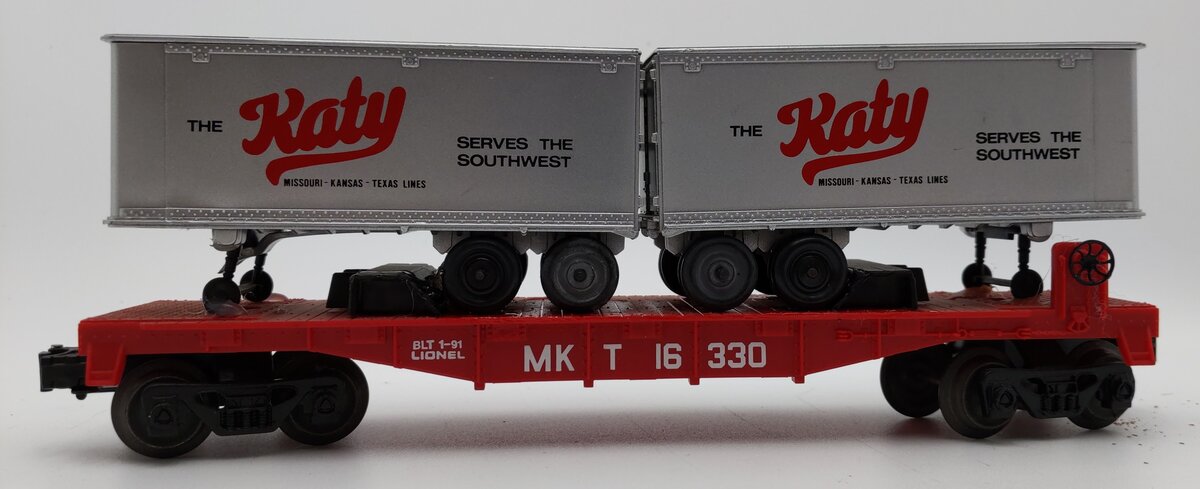 Lionel 6-16330 O Gauge Missouri, Kansas & Texas Flatcar w/ Trailers EX/Box