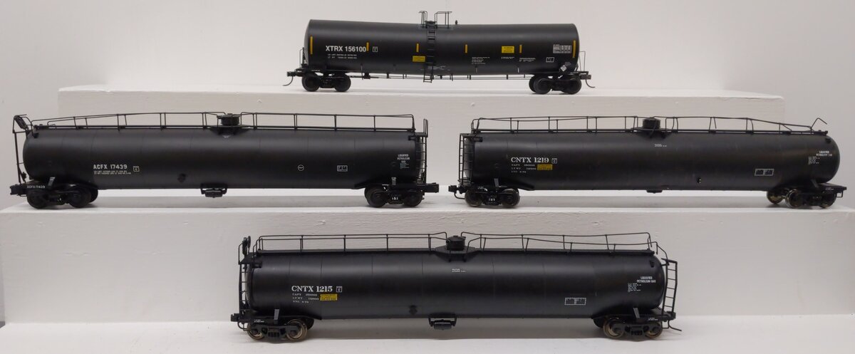 Atlas O Scale Assorted Tank Cars: 156100, 1215, 1219, 17439 (2-Rail) [4]