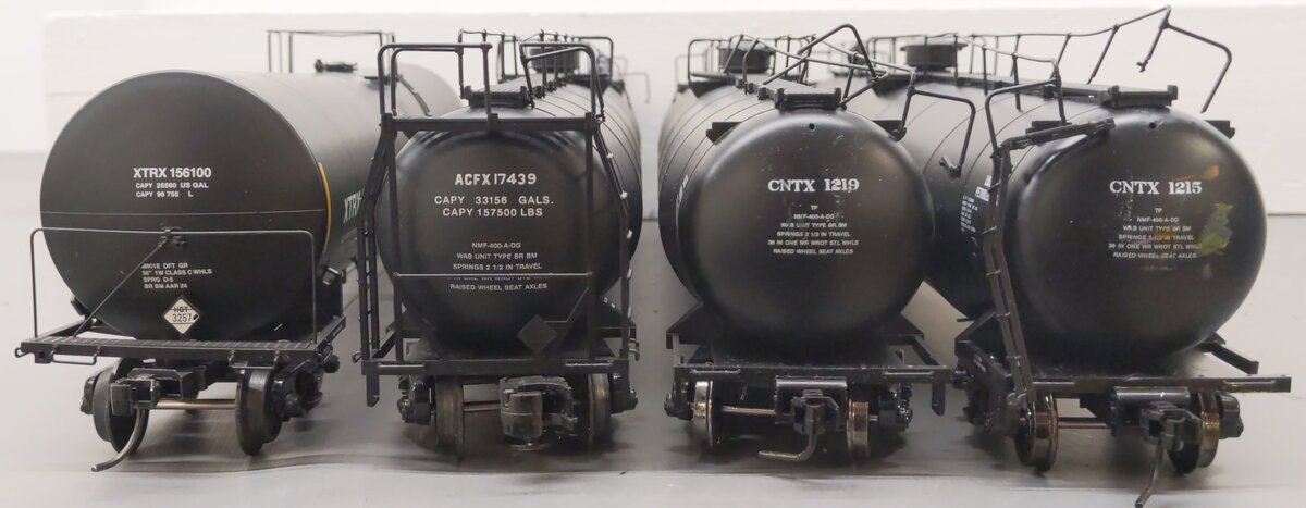 Atlas O Scale Assorted Tank Cars: 156100, 1215, 1219, 17439 (2-Rail) [4]