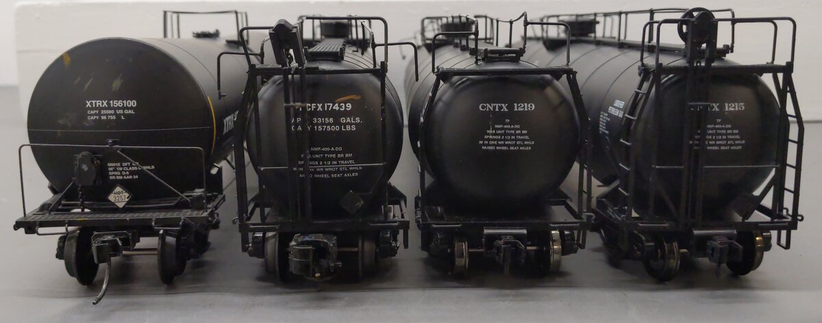 Atlas O Scale Assorted Tank Cars: 156100, 1215, 1219, 17439 (2-Rail) [4]
