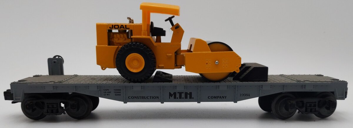 MTH 30-7619 O Gauge MTH Construction Flatcar with Pavement Compactor EX