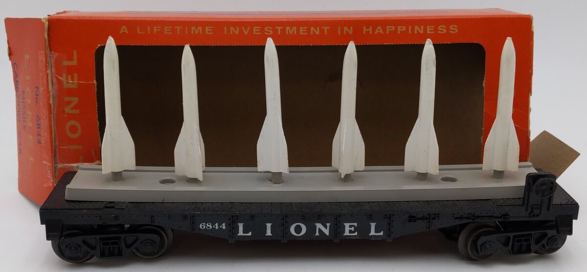 Lionel 6844 Vintage O Black Flatcar with 6 Small White Missiles VG/Box