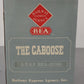 REA 42106 G Scale ATSF Red "The Caboose" #42106 EX/Box