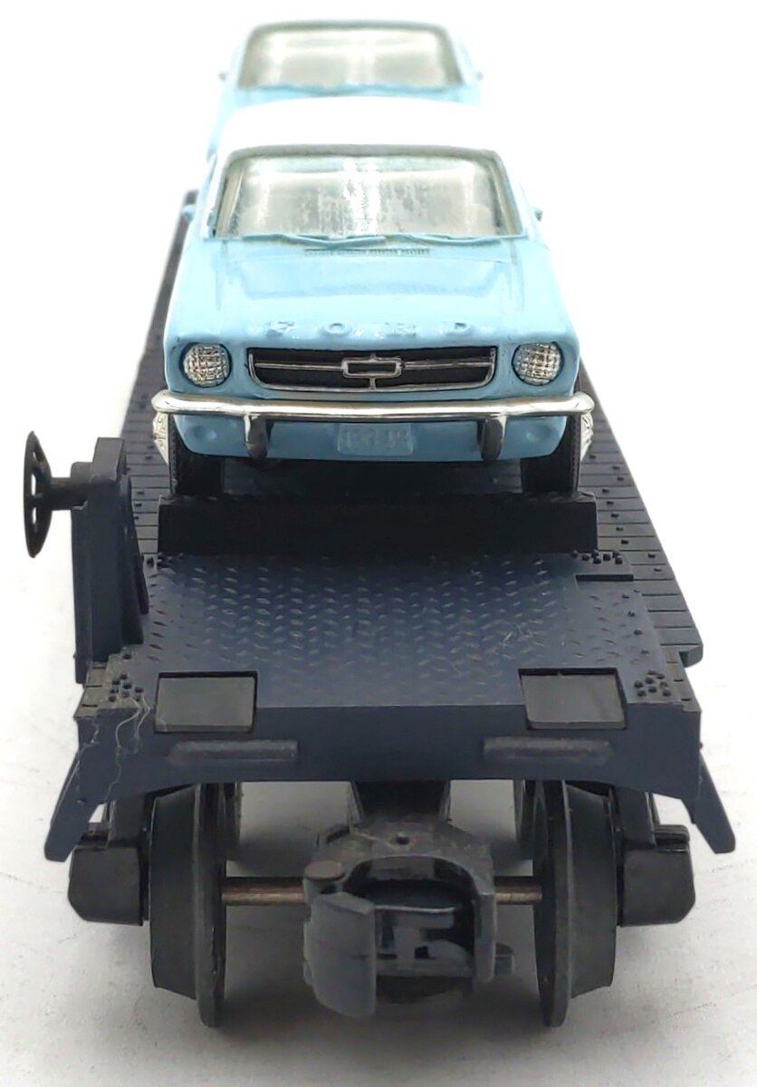 MTH 30-7617 O Gauge MTH Auto Transport Flat Car with 2 Ertl '64 Mustangs EX