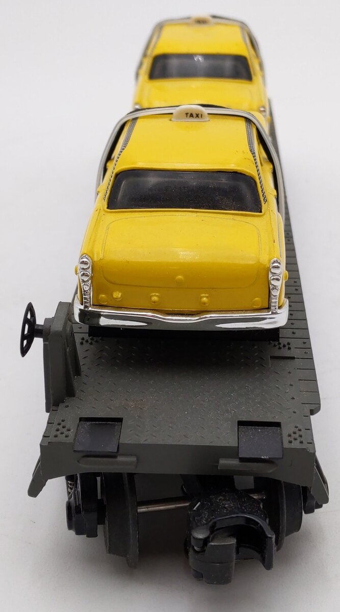 MTH 30-7625 O Gauge MTH Auto Transport Flatcar w/ Ertl Checker Cabs #1959 EX