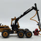 Norscot 55123 1:50 Diecast Caterpillar 580B Harvester With HH65 Cutting Head NIB