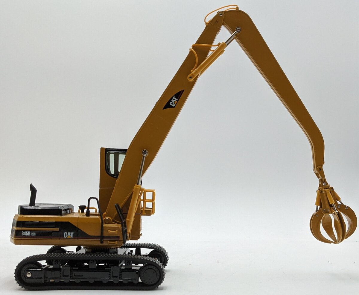 Norscot 55080 1:50 Diecast CAT 345B Series II Material Handler W/Work Tools LN/Box