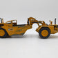 NZG 127 1:50 Scale Diecast Caterpillar 627 Push-Pull Scraper - Weathered EX