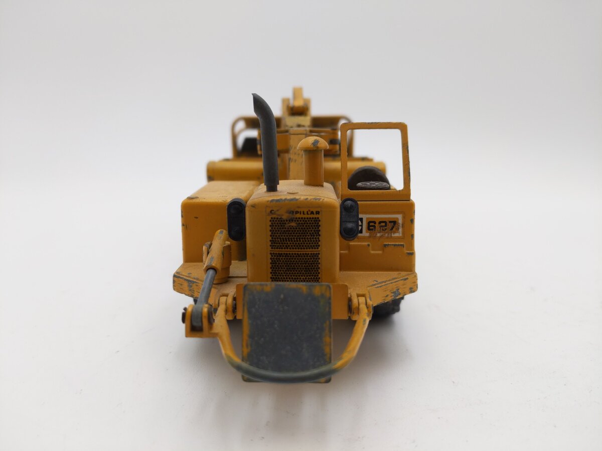 NZG 127 1:50 Scale Diecast Caterpillar 627 Push-Pull Scraper - Weathered EX