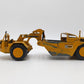 NZG 127 1:50 Scale Diecast Caterpillar 627 Push-Pull Scraper - Weathered EX