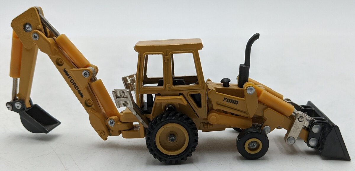 Ertl 885 1:64 Diecast Ford Tractor Loader Backhoe LN