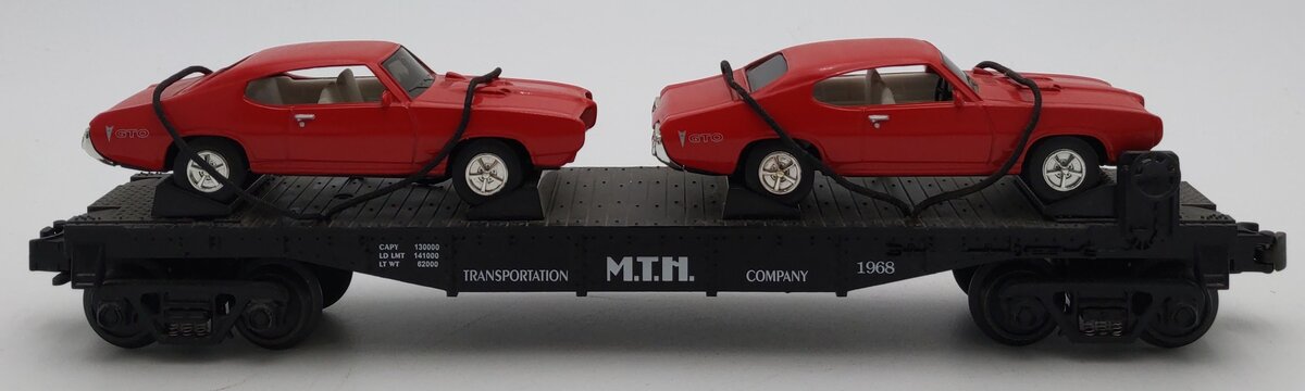MTH 30-7639 O Gauge MTH Auto Transportation Flatcar with 2 Ertl '68 GTOs #1968 LN/Box