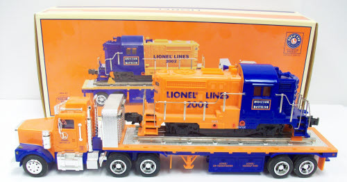 TMT 18416 Flatbed Truck With Non-Powered Diesel Locomotive LN/Box