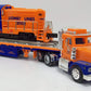 TMT 18416 Flatbed Truck With Non-Powered Diesel Locomotive