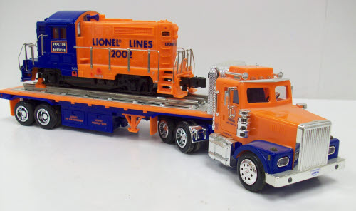TMT 18416 Flatbed Truck With Non-Powered Diesel Locomotive LN/Box